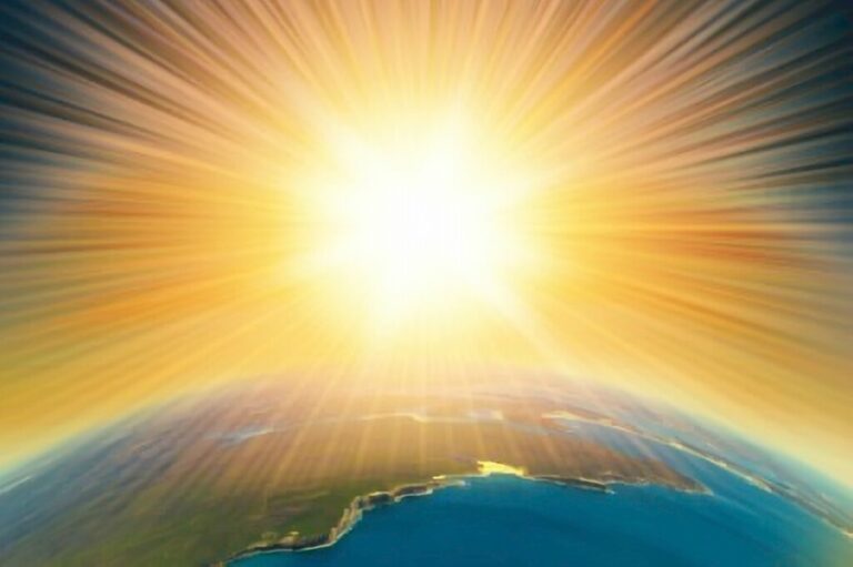 Radiant sunrise over Earth symbolizing the orgasm of light—sacred expansion into energetic wholeness and planetary awakening